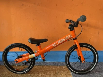 Islabikes Rothan 14 In Orange Kids Bike With Bell Excellent Condition - Image 1 of 4