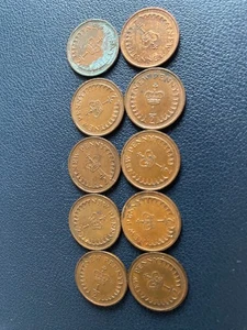 Bundle of x10 UK decimal half pence coins, 1971, 73, 76, 79, 80 - Picture 1 of 3
