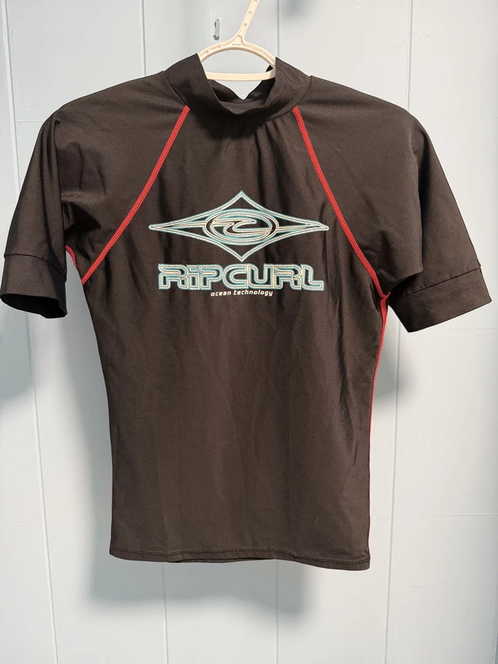 RIP CURL WET SUIT Rash Guard Surf Camiseta Negra Juvenil Vintage Etiqueta Talla Desconocida  Foto 1 de 4