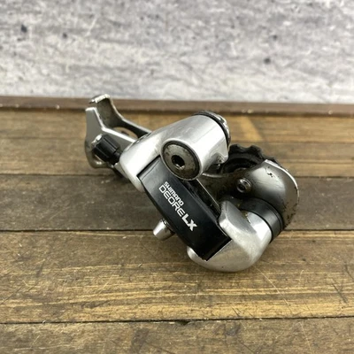 Vintage Shimano Deore LX RD-M560 Rear Derailleur Japan MTB 7-Speed Long Cage - Image 1 of 4