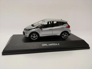 [NUEVO] Modelo de coche OPEL Ampera E 1:43 cristal plata modelo coleccionista OC11015 - Imagen 1 de 6