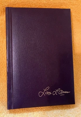 Louis L'Amour Hardcover Leatherette Gold Leaf Book - The Outlaws of Mesquite - Image 1 of 4