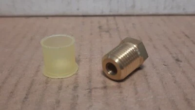 PARKER  HOLLOW BRASS PLUG (1/4” NPTF, .560” OVER HEX, .750” LG.)  X111N - Image 1 of 4