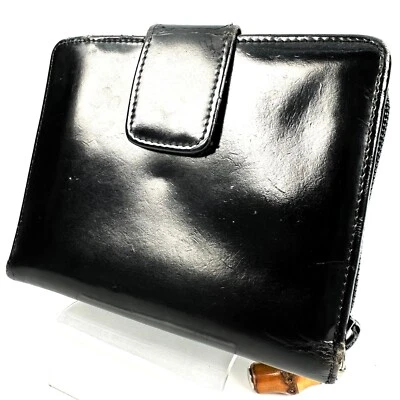 Auténtica billetera plegable de cuero con cremallera alrededor de bambú Gucci Foto 1 de 4