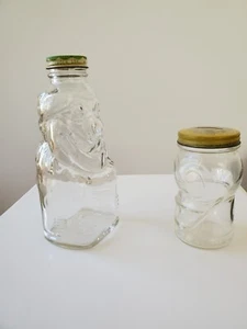 Two vintage glass bottle banks - Donald Duck & Clown - Picture 1 of 4