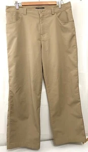 210034 Pantalones elásticos de poliéster caqui bronceado para hombre US 34 x 27 Royal Robbins Usado en excelente condición - Imagen 1 de 4