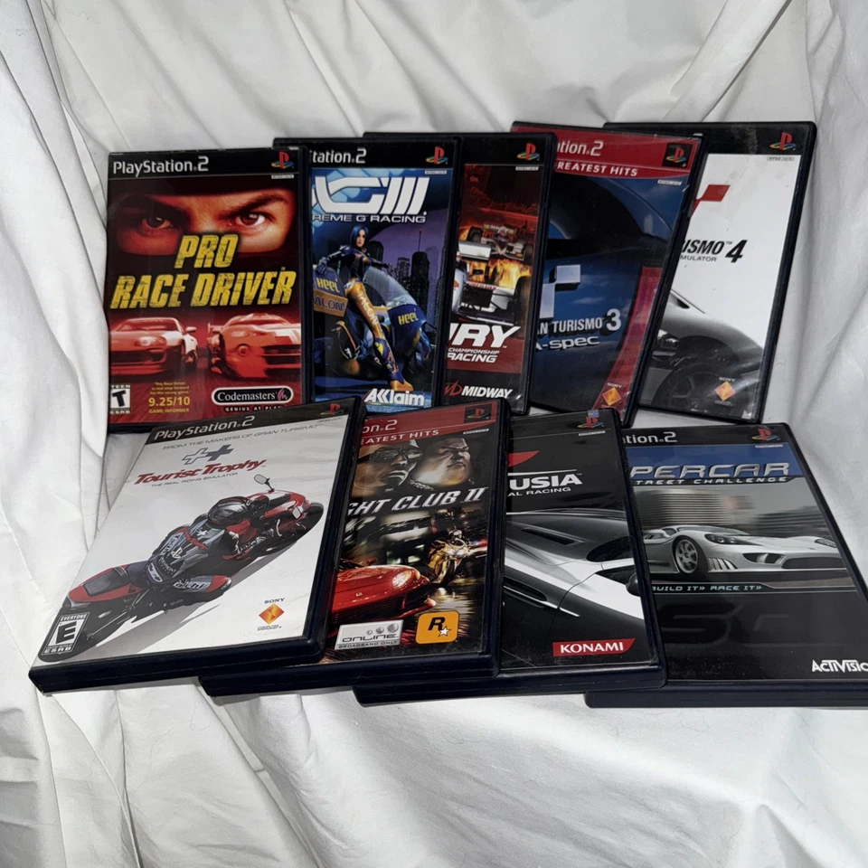 Lote de juegos Ps2 PlayStation con manuales de 9 Gran Turismo 3&4, Pro Race Driver etc. Foto 1 de 4