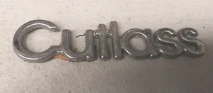 Old OLDSMOBILE CUTLASS Car Badge - Picture 1 of 1