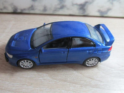 1/36 Kinsmart 2008 Mitsubishi Lancer Evo Evolution X diecast pulback 5" azul Foto 1 de 4