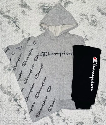 Paquete de camiseta, sudadera con capucha y joggers Champion gris/negro para niños (3 piezas) talla/M (10-12) Foto 1 de 4