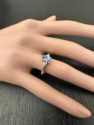 Anillo de oro blanco macizo de 14 quilates con tanzanita azul natural y diamantes de 3,00 quilates Foto 1 de 4