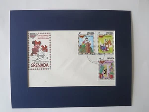 A Walt Disney Christmas with Minnie Mouse, Mickey Pluto plus their own stamps - Picture 1 of 1