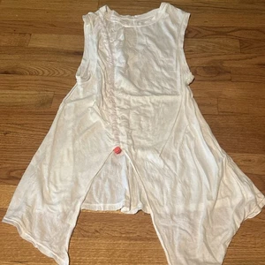 Top Free People Movement blanco sin mangas rosa con cordón mediano - Imagen 1 de 5