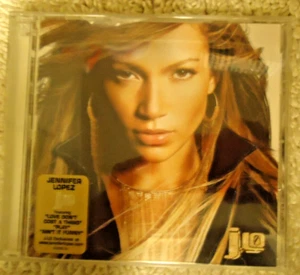 J Lo CD Love Don't Cost I'm Real Play Walking on Sunshine Carino Secretly & More - Imagen 1 de 3
