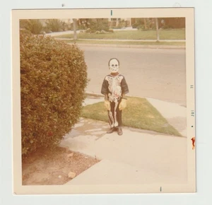 VINTAGE SNAPSHOT: KID IN SKELETON HALLOWEEN COSTUME - Picture 1 of 1