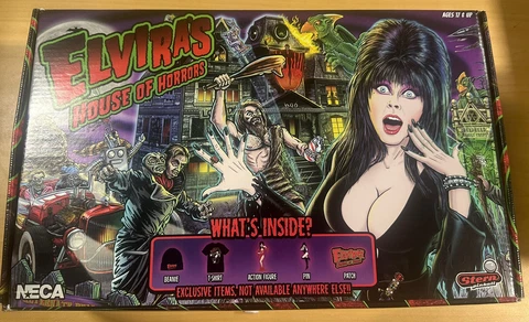 Neca Elvira’s House Of Horrors Set (Includes Beanie, Shirt, Figure, Pin & Patch) Cover