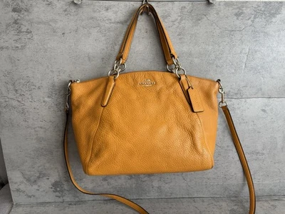 Auth COACH SMALL KELSEY SATCHEL IN PEBBLE LEATHER (F36675) MUSTARD Crossbody Bag - Image 1 of 4