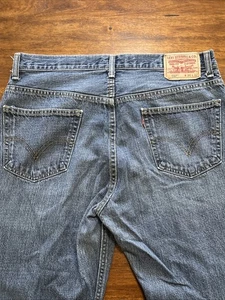 Vintage Levi's 557 Relaxed Bootcut Jeans Men's 36x32 Blue Medium Wash Denim - Picture 1 of 11