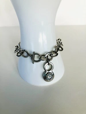 Pulsera con dije infinito de acero inoxidable NH con detalles de cristal Foto 1 de 4