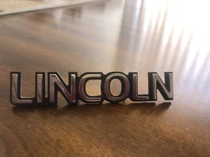 1993 1998 Lincoln Mark VIII TRUNK  EMBLEM COLOR SILVER - Picture 1 of 3