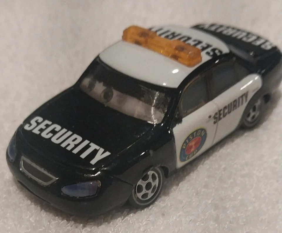 Disney Pixar Cars Lenticular Eyes Marlon Clutches McKay Security 2009 1:55 Foto 1 de 4