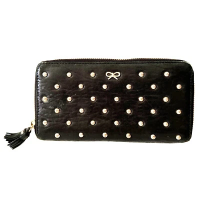 Cartera ANYA HINDMARCH Cremallera Alrededor Cuero Negro Tono Dorado Tachuelas Borla Foto 1 de 4