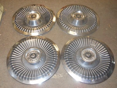 Juego de 4 cubiertas de cubo de rueda Mercury 1966 1967 usadas cabeza Mercury Foto 1 de 4