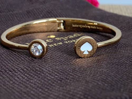 Bracciale Kate Spade New York oro con vanga avorio e strass con sacchetto antipolvere us intime ottimeioni!
