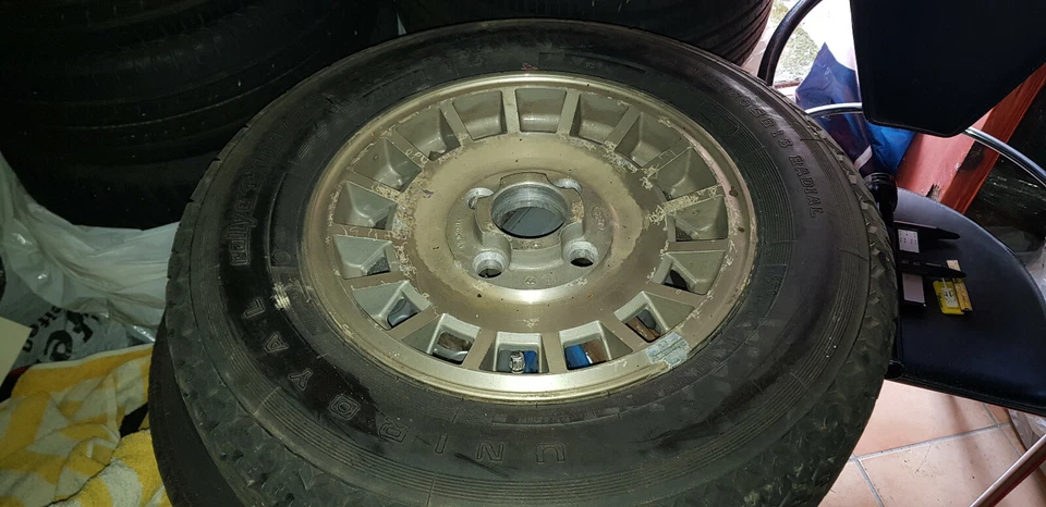 FORD TAUNUS ALUFELGE MIT REIFEN 185/70SR13  76BB-1007-AD - Bild 1 von 1