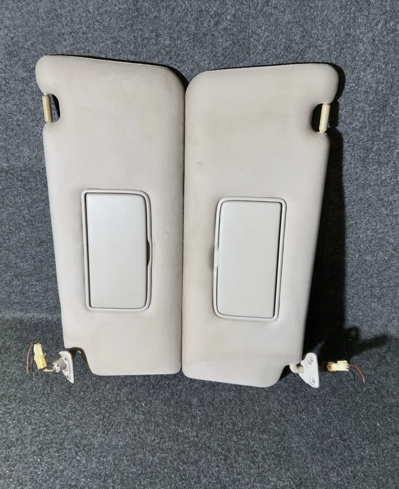 Nissan Titan Armada QX56 2004-2010 par de parasoles lado del conductor pasajero gris OEM Foto 1 de 4