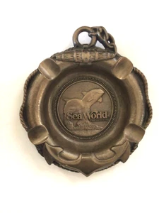 Vintage Sea World  Adventure Park Ashtray Cast Aluminum Dolphins Souvenir - Picture 1 of 3