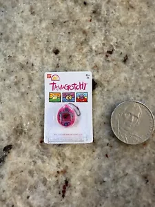 ZURU Mini Brands Toys - Pink Tamagotchi Electronic Virtual Pet - Picture 1 of 2