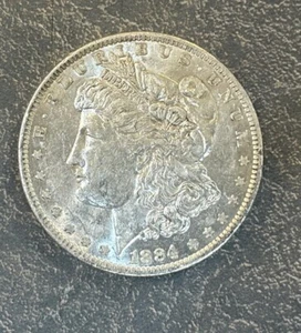 1884-o Morgan Silver Dollar BRILLIANT UNCIRCULATED 90% Silver Morgan Dollar - Picture 1 of 9