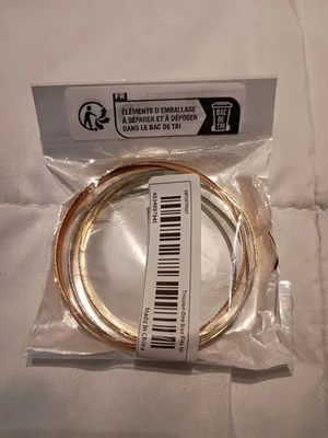 3 pulseras brazalete.  1 oro, 1 plata, 1 oro rosa en color Foto 1 de 2