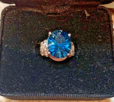 CID 10 KT. ANILLO ORO BLANCO LONDRES TOPACIO AZUL Y DIAMANTES DETALLES, 6 1/2, 4,7 gramos Foto 1 de 4