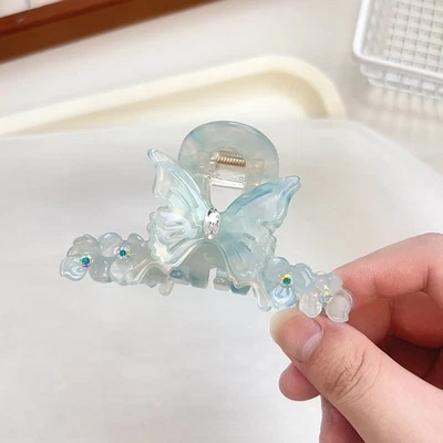 Dulce garra de pelo floral mariposa tamaño mediano acetato clip para mujer cola de caballo Foto 1 de 4