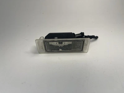 2010-2016 Cadillac SRX License Plate Lights Lamp Assembly - Image 1 of 3