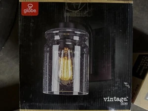 Globe Crowe Matte Black 1-light Outdoor Wall Sconce W/ Seeded Glass Shade - Picture 1 of 1