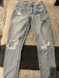 Pantalones de mezclilla azules desgastados de fábrica para dama talla 5 - Imagen 1 de 4