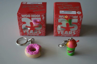 (2 Pack) The Simpsons: 25th Anniversary - Keychains - Donut & Squishee --NEW - Image 1 of 4
