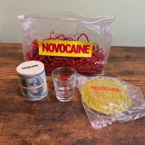 NOVOCAINE Movie Promo SHOT GLASS Stress Money Roll Hot Cold Bag RARE Jack Quaid - Picture 1 of 10