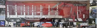Peterbilt 379 tractor with crane and flatbed trailer with log stakes - Image 1 of 3