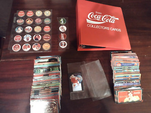 Coca Cola Trading Cards,  Pogs and  one  Binder see photos