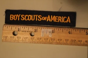 PARCHE TIRA BARRA "BOY SCOUTS OF AMERICA" (azul y dorado) - Camisa OFICIAL BSA Scout - Imagen 1 de 1