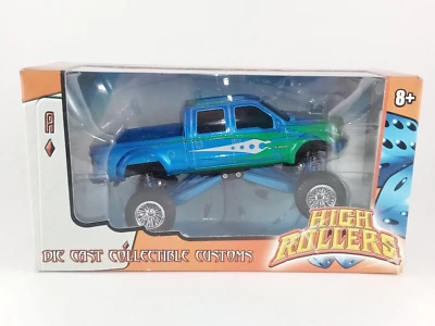 Camioneta Ford F-250/350 azul con calcomanías rodillos altos elevada diecast 1:43 Foto 1 de 4