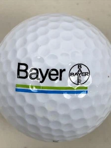 Bola de golf con logotipo de Bayer (1) parte superior Flite XL 2000 distancia usada - Imagen 1 de 4