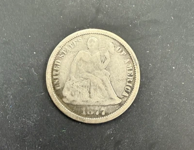 Moneda de plata de Estados Unidos Love Token “The Dog” de 1877 Foto 1 de 3