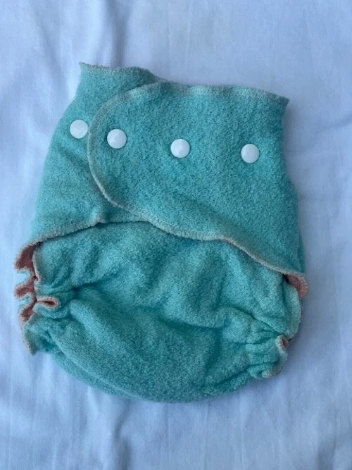 Crepé Loveybums grande de lana como nuevo/melón. Ajuste 9-22 libras Foto 1 de 2