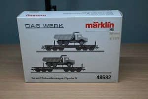 Marklin 48692 HO Scale 2 Heavy Duty Flat Cars with Dump Trucks - Picture 1 of 5