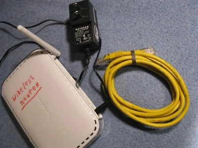 Netgear Wireless Router bundle WGR614 v9= ethernet cable-Power adapter - Image 1 of 4